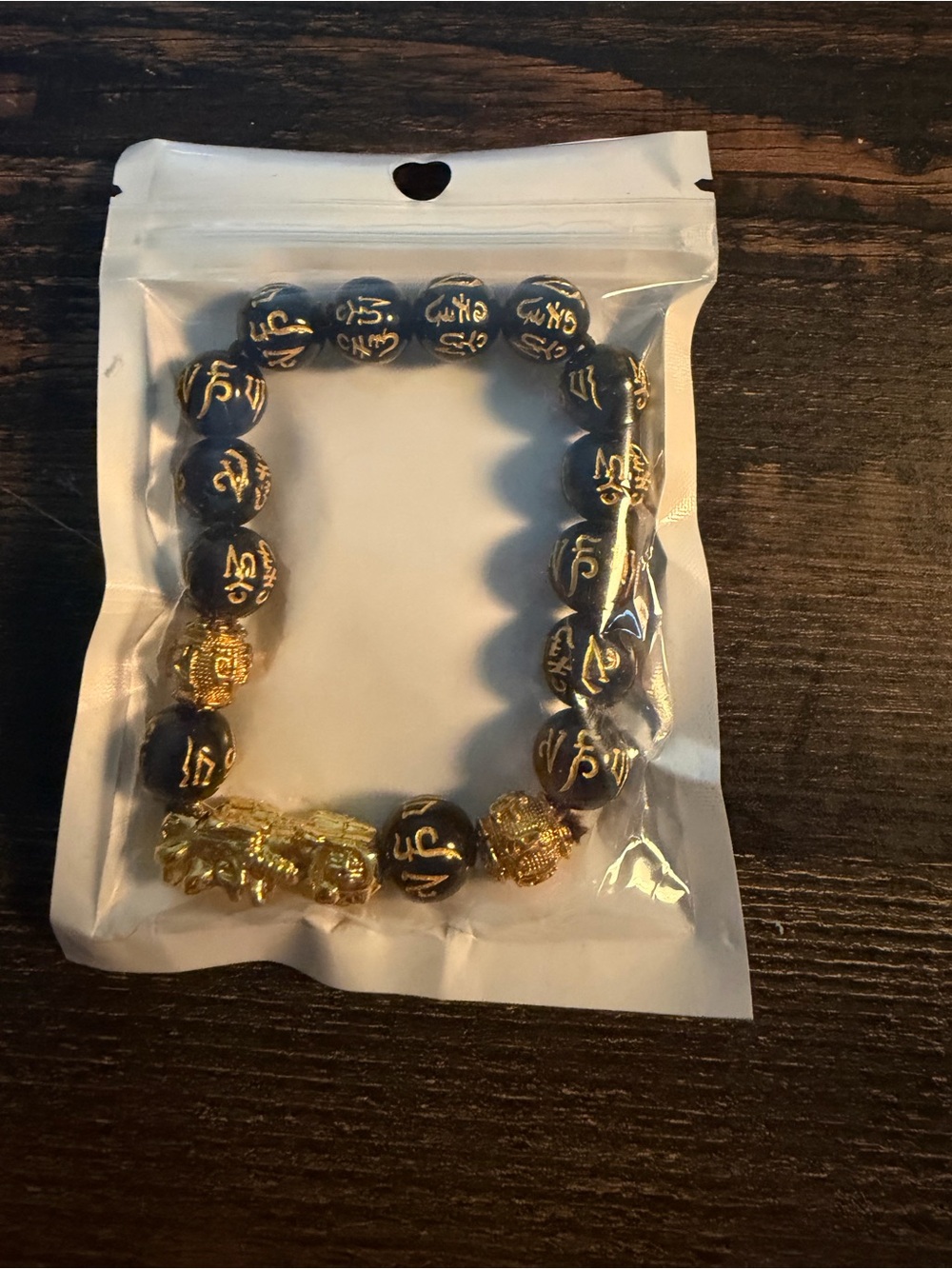 Gold and Black Buddhist Mantra Beaded Bracelet